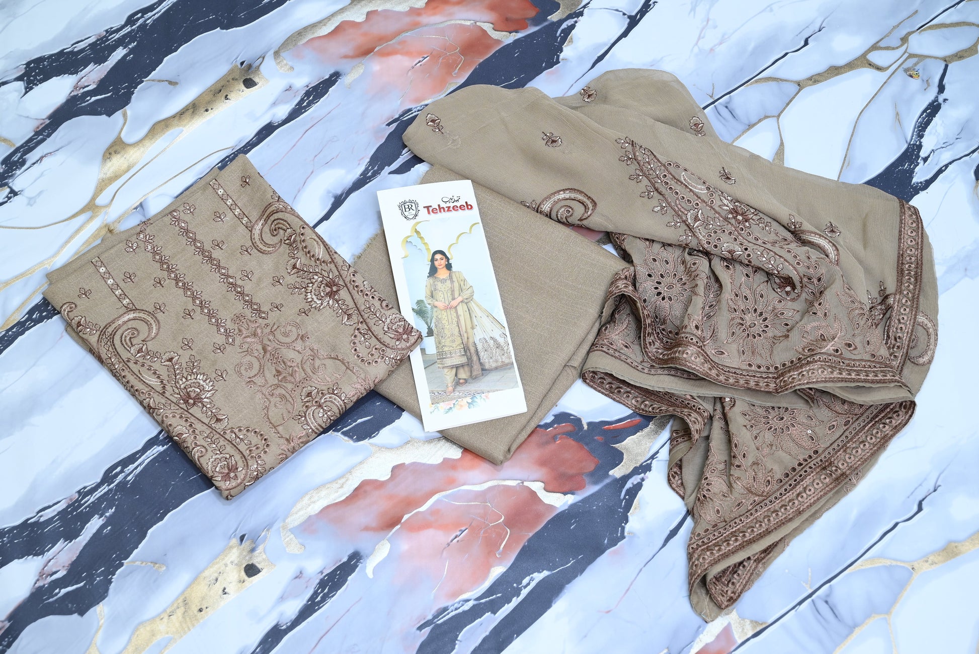 5505-T. 3-Piece Unstitched Premium Signature Karandi Suit – Embroidered Shirt, Heavy Embroidered Chiffon Dupatta & Trouser