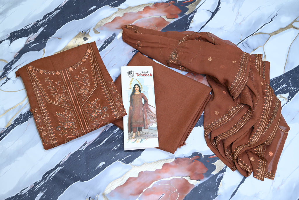 5505-T. 3-Piece Unstitched Premium Signature Karandi Suit – Embroidered Shirt, Heavy Embroidered Chiffon Dupatta & Trouser